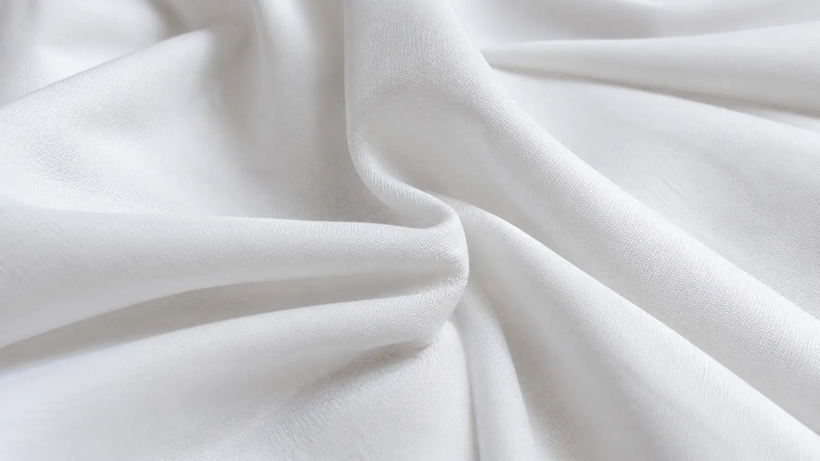 Dikişsiz beyaz ihram kumaşının yakın g&ouml;r&uuml;n&uuml;m&uuml;.